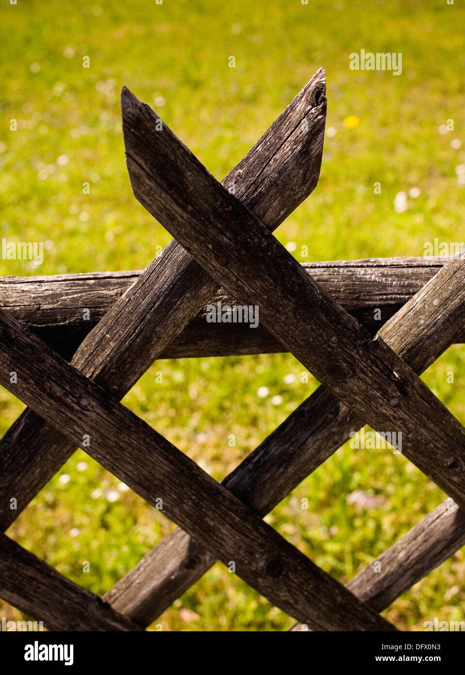 Wood Fence With Criss-Cross Pattern, Close-Up Stock Photo