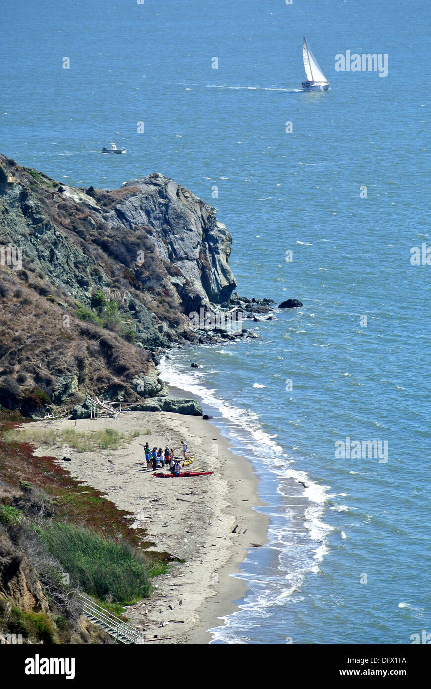 kayakers beach kayaks on remote cove on Angel Island state park Stock