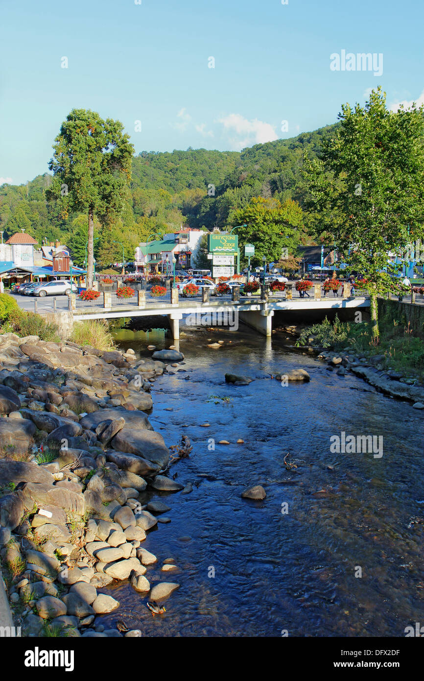 Bridge over the Little Pigeon River in downtown Gatlinburg, Tennessee vertical Stock Photo