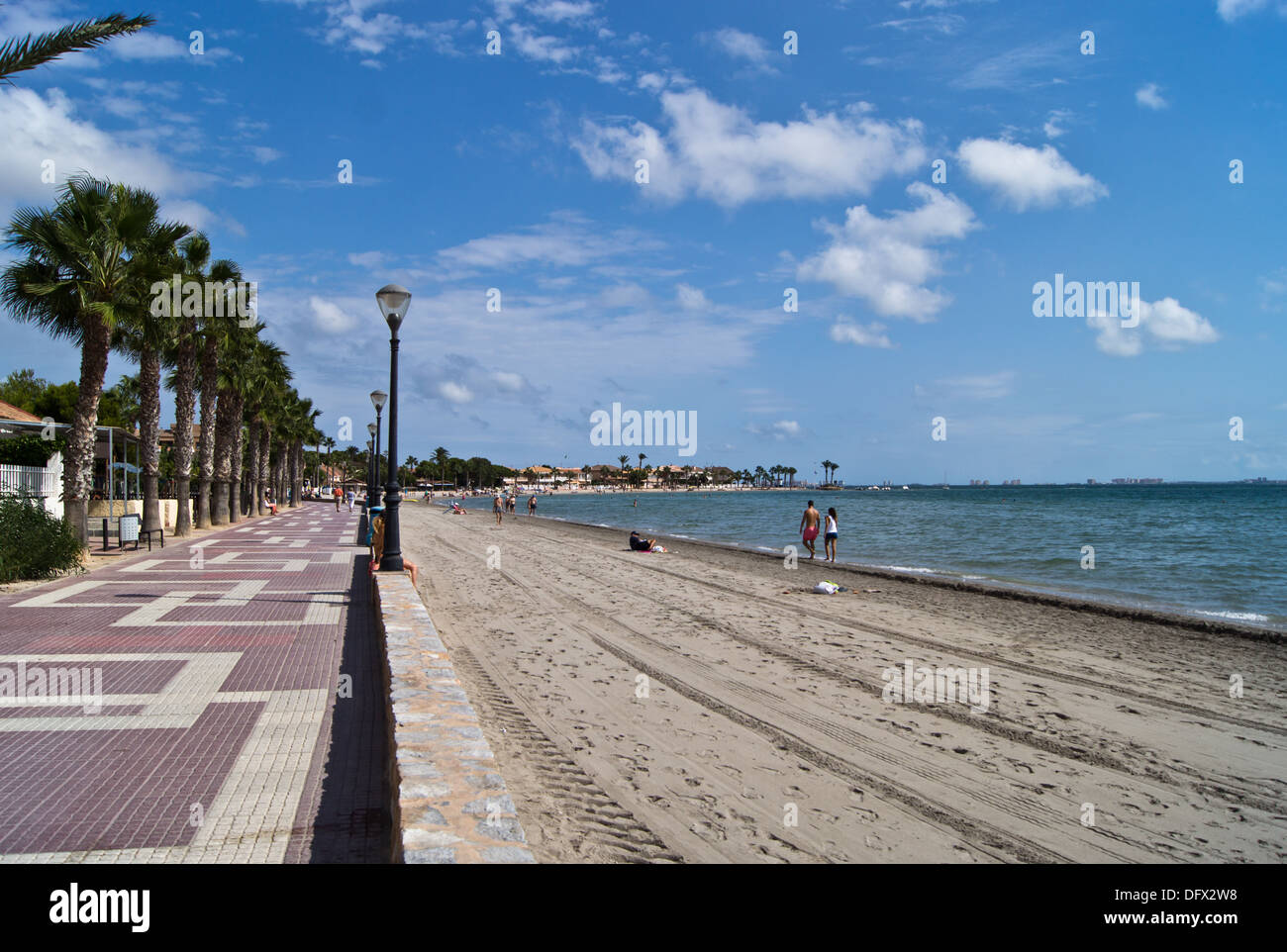 Tourist and locals on the beach in Los Alcazares Murcia Spain mar menor Stock Photo