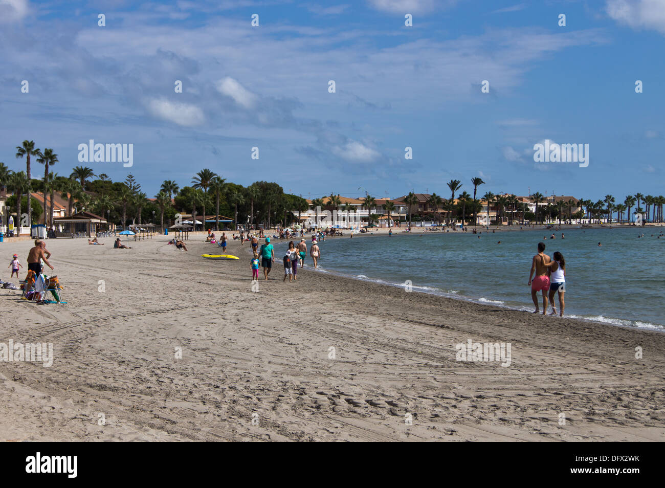 Tourist and locals on the beach in Los Alcazares Murcia Spain mar menor Stock Photo