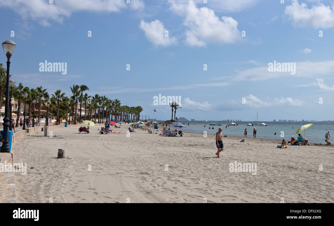 Tourist and locals on the beach in Los Alcazares Murcia Spain Stock Photo