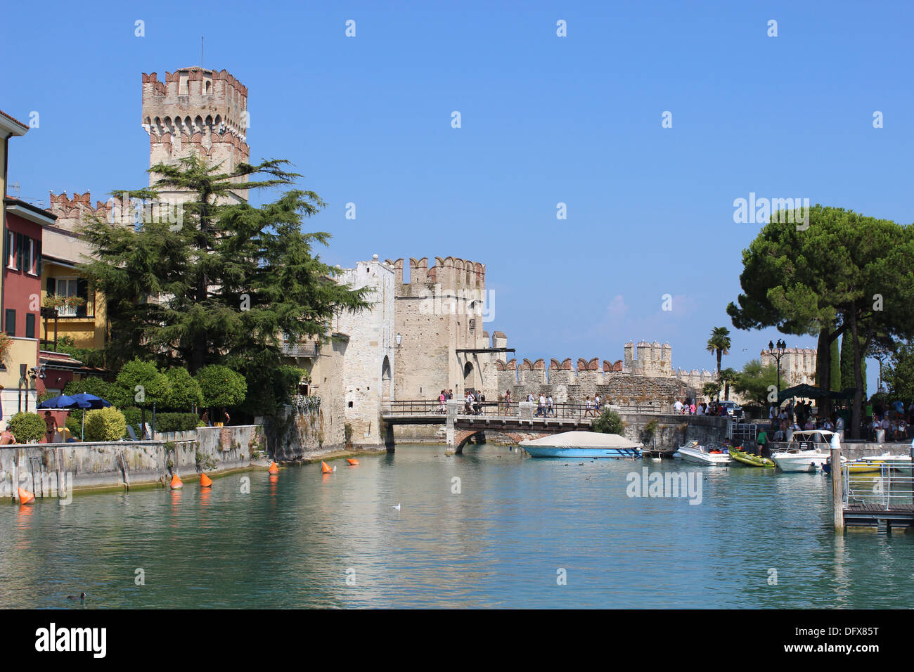 Rocca Scaligera or Scaliger Castle and harbor area at Sirmione on Lake ...