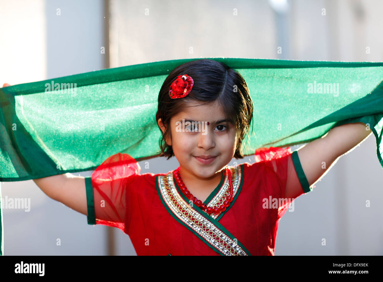 Portrait of an indian american girl playing outdoors Stock Photo