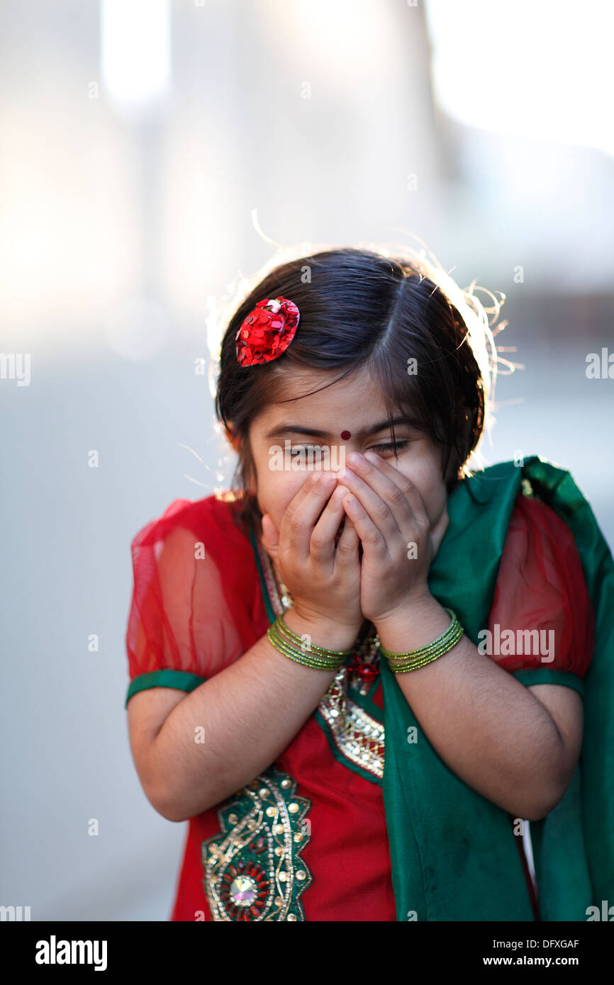Portrait of an indian american girl playing outdoors Stock Photo