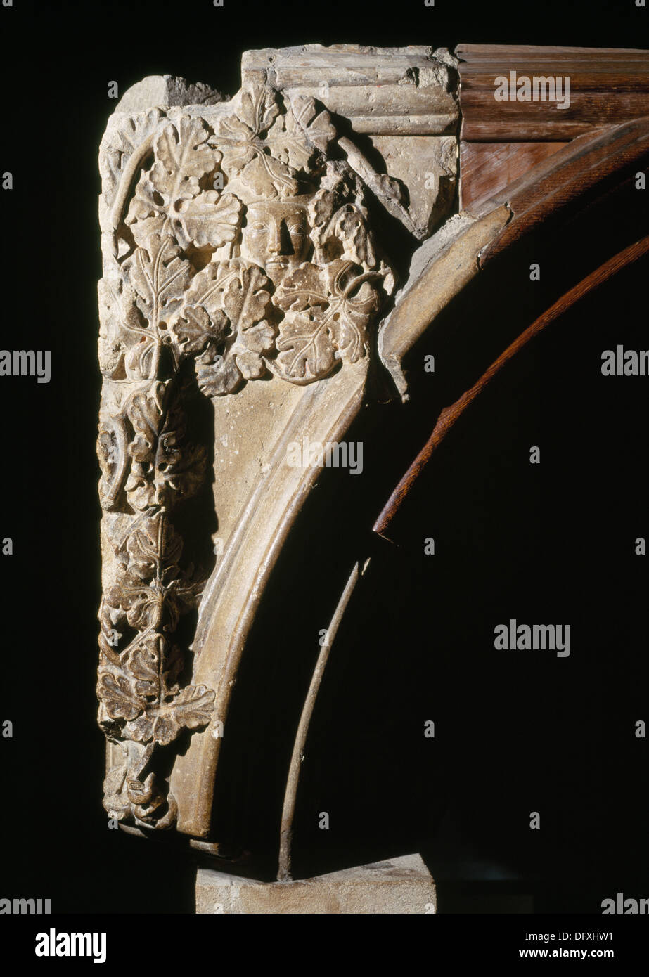 A wimpled female face surrounded by foliage on a fragment of St Frideswide's C13th shrine in Christ Church Cathedral, Oxford. Stock Photo