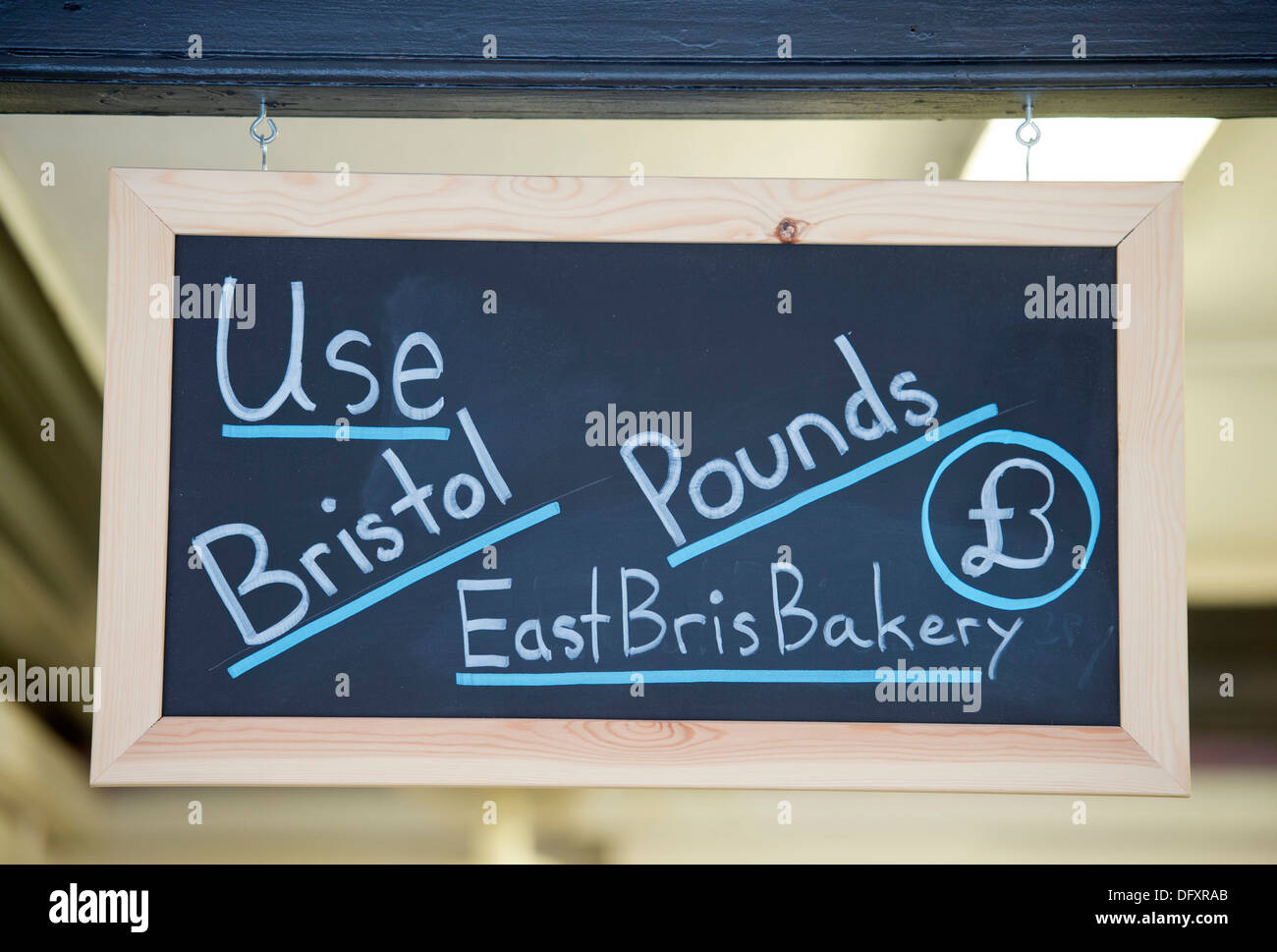 Sign promoting the use of the Bristol Pound at The East Bristol Bakery UK Stock Photo