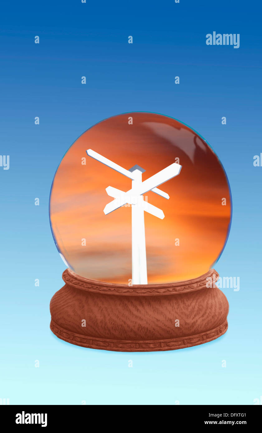 Crystal ball showing sign post Stock Photo