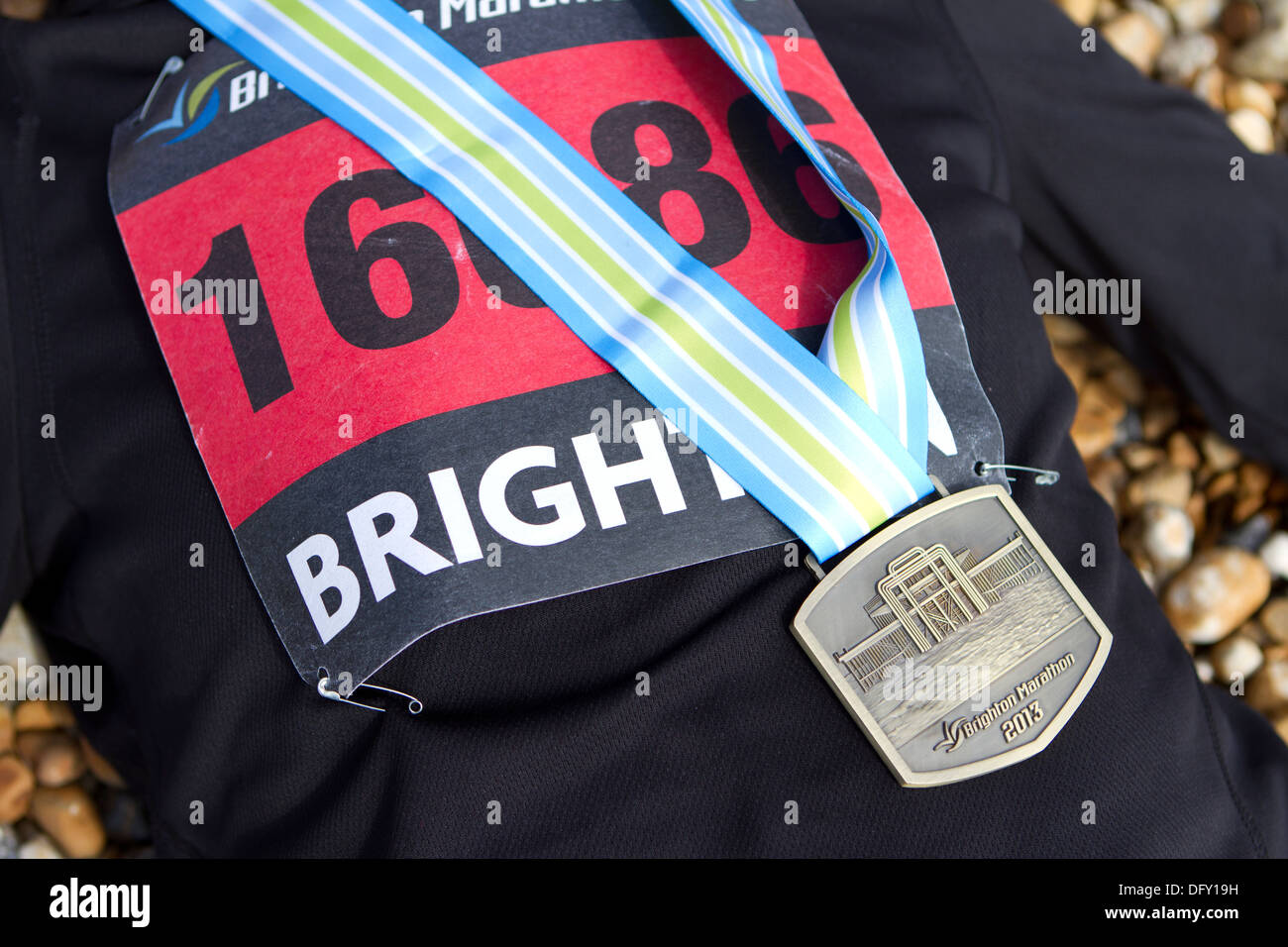 Brighton Marathon race number bib and finisher's medal. Stock Photo