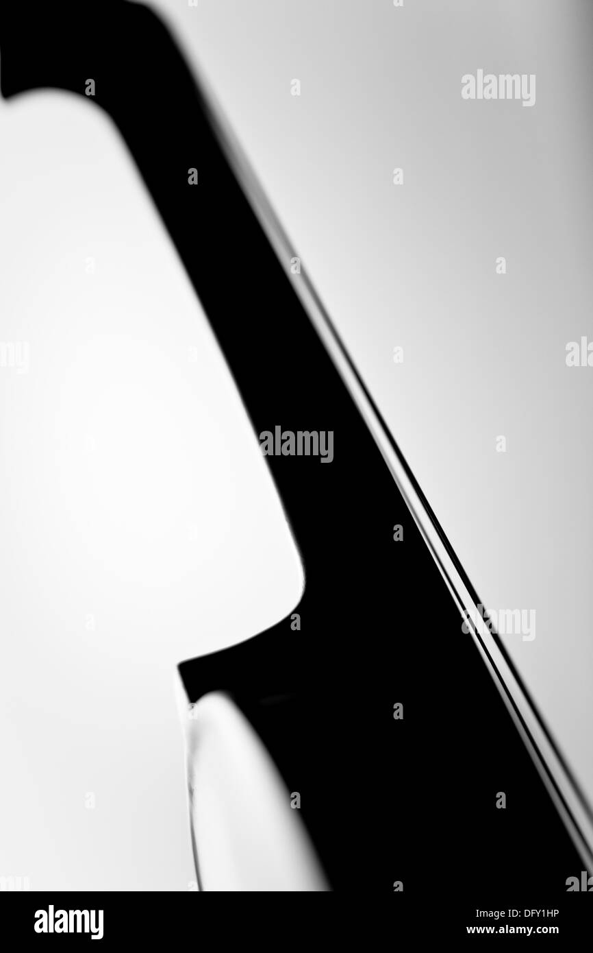Detail of a violin and bow making music Black and white Abstract