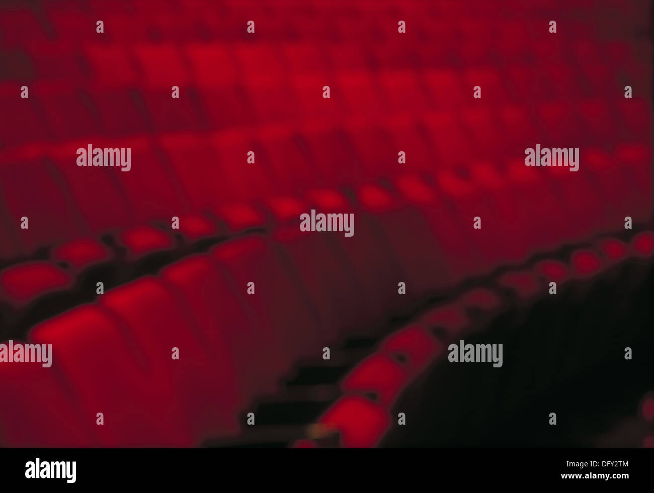 Red theatre seats in rows Stock Photo Alamy
