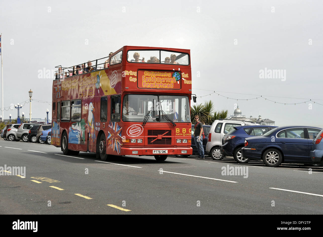 Eastbourne open topped sightseeing bus with passengers on Grand Parade, Eastbourne Stock Photo