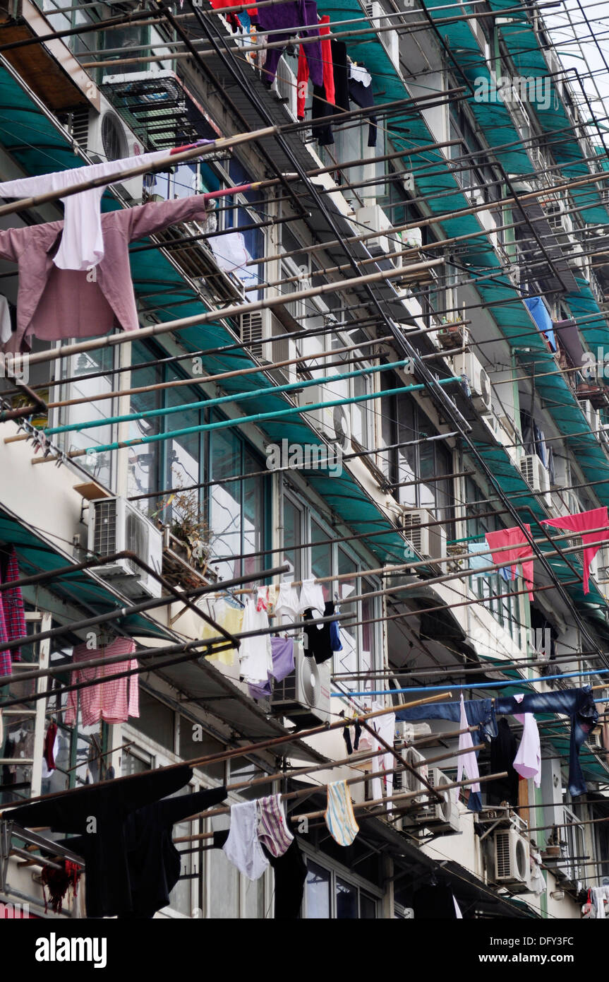 Shanghai (China): laundry drying outside the windows of a big