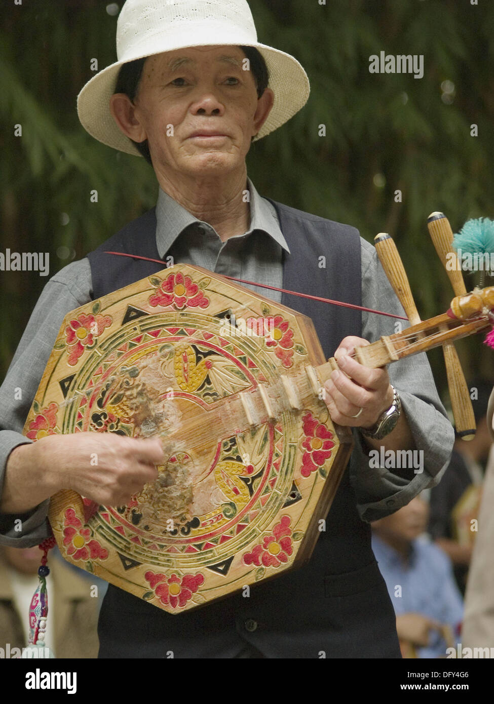 musician with traditional banjo, Kunming, China Stock Photo Alamy