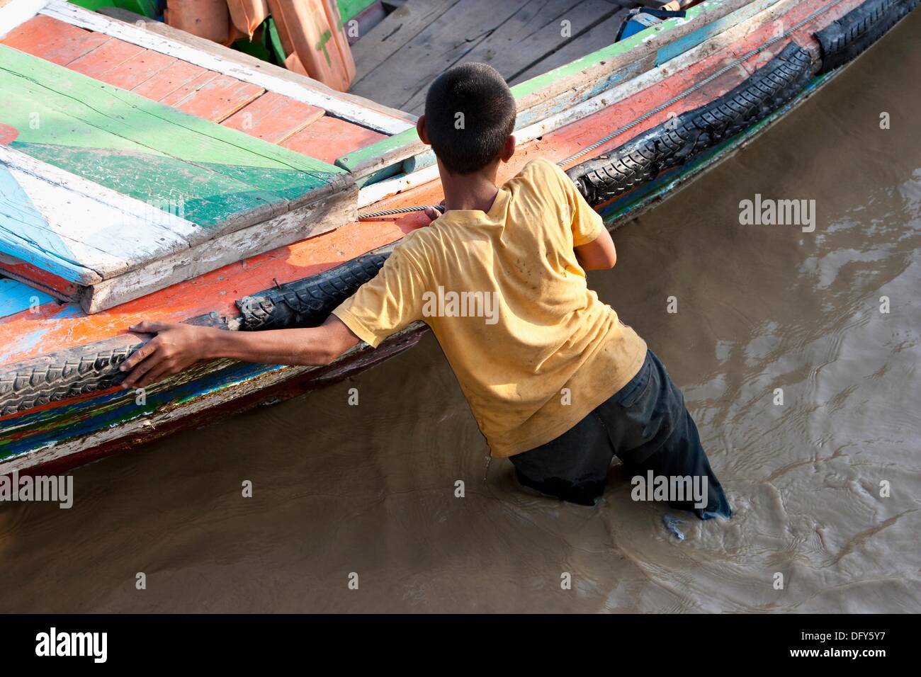 Pushing Raft Boy pushing boat hi-res stock photography and images - Alamy