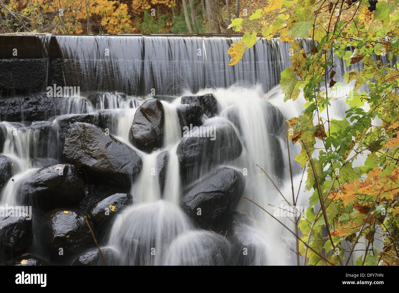 Old dam and waterfall at Wile Carding Mill Museum in Bridgewater, Nova