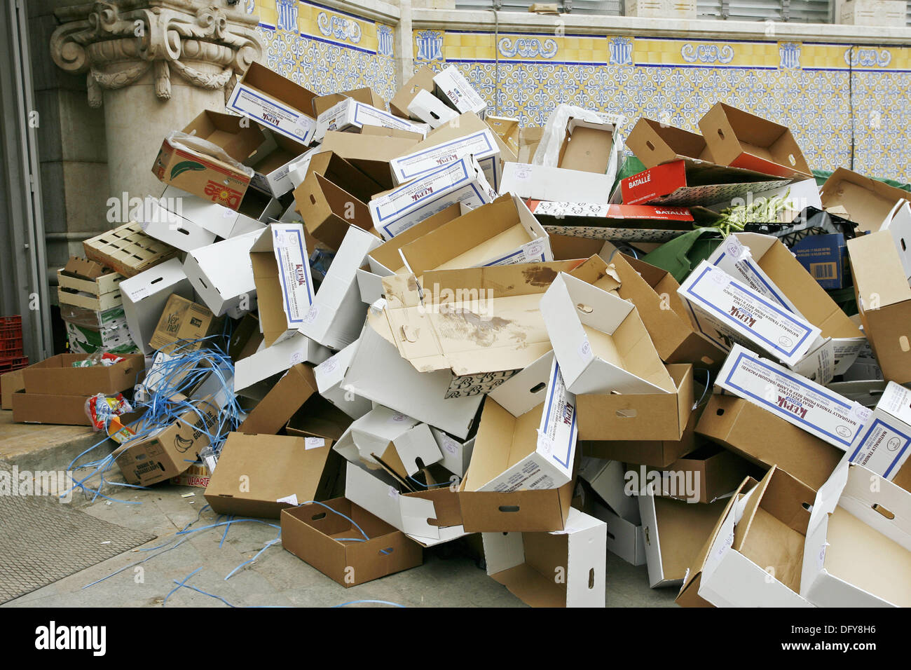 Close-up large cardboard piles lie on top Stock Photo by YouraPechkin