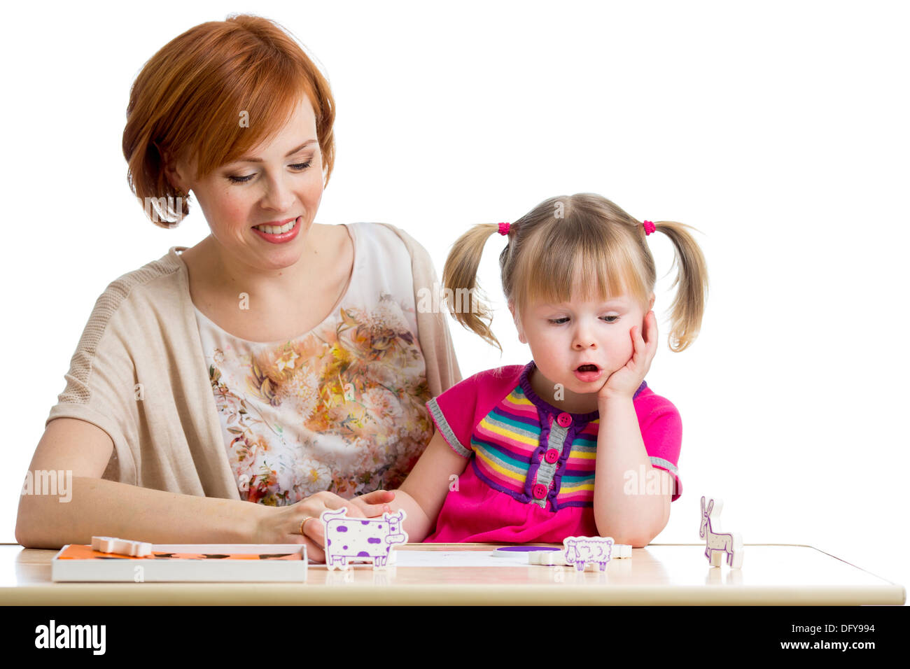 kid and mother have pastime together Stock Photo