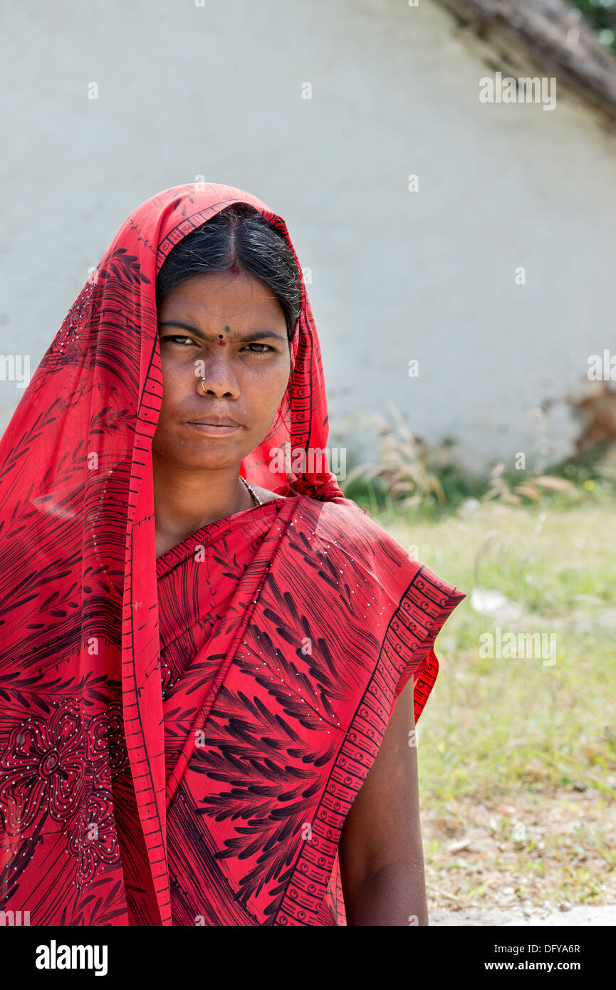 Portrait Of A Young Indian Woman Wearing A Red Saree Clothes And Showing A  Welcome Gestures, Isolated On White Background Stock Photo, Picture and  Royalty Free Image. Image 74474945.