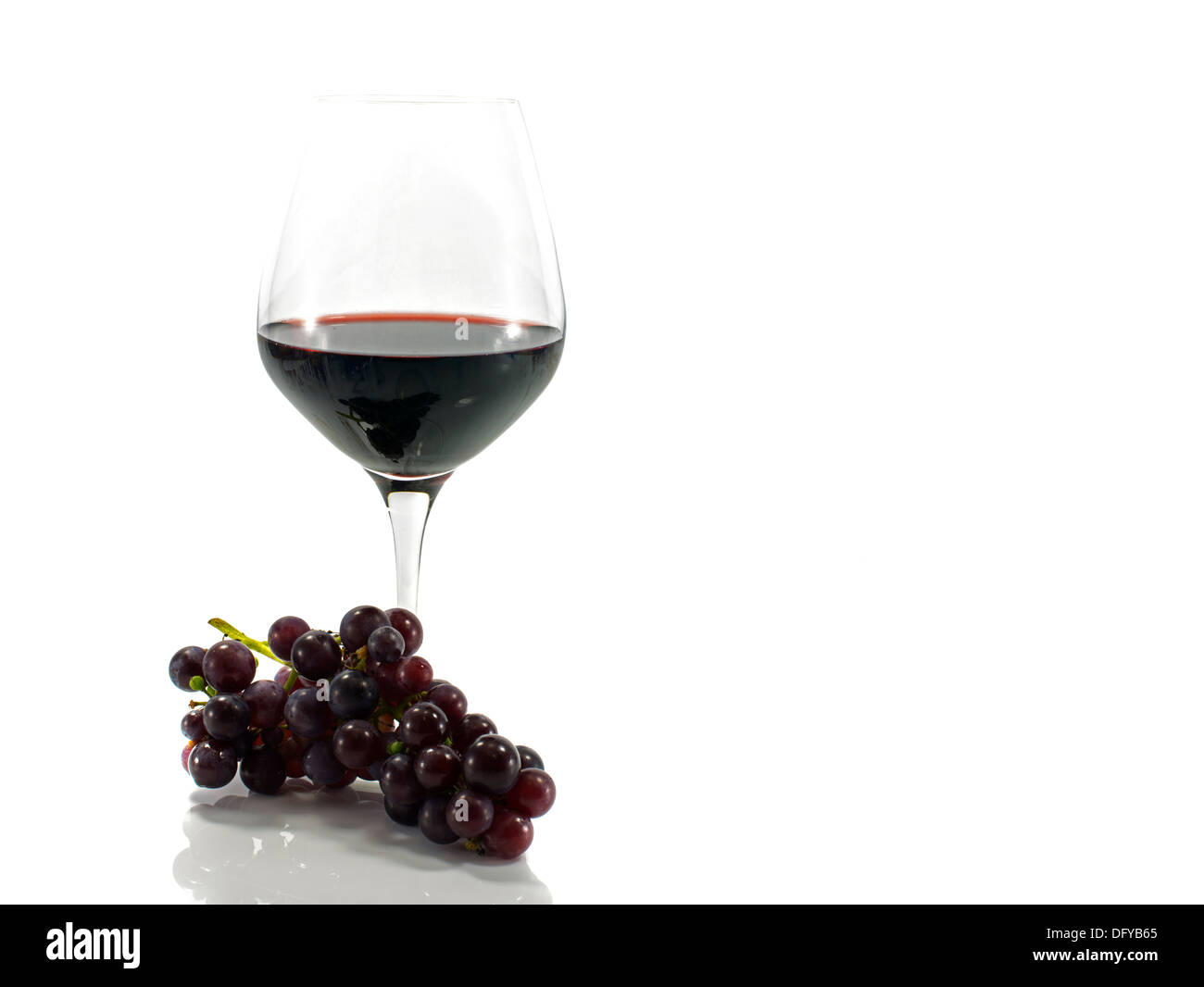 red wine and grapes isolated on white background Stock Photo