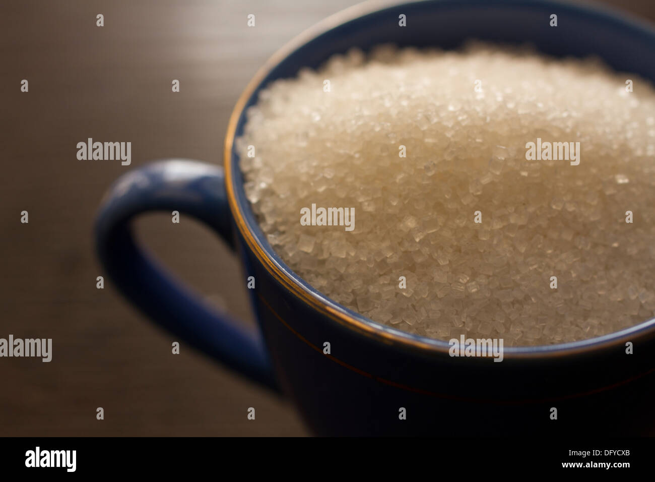 A cup full of sugar. Stock Photo