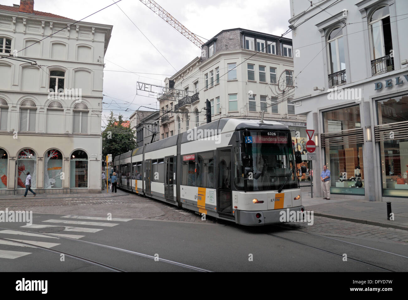 A modern multi carriage HermeLijn No 1 tram to Flanders Expo in historic Ghent (Gent), East Flanders, Belgium. Stock Photo