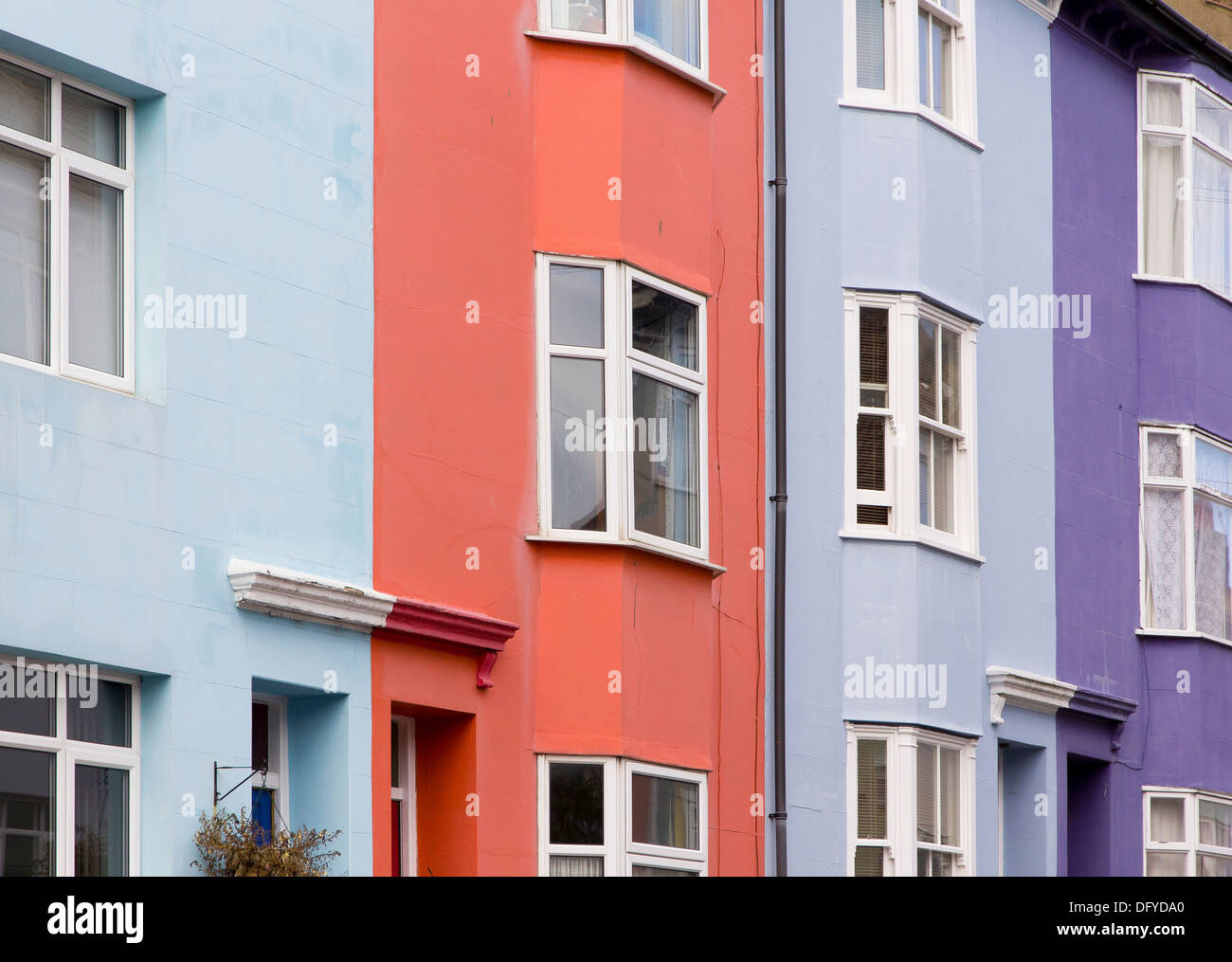 Colourful three storey terraced homes in the Hanover District of Brighton in Islingword Place Stock Photo