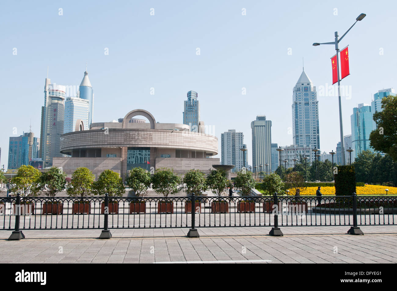 Shanghai Museum with skyscrapers on background: Lippo Plaza, Golden Bell Plaza, Lan Sheng Building and others Stock Photo