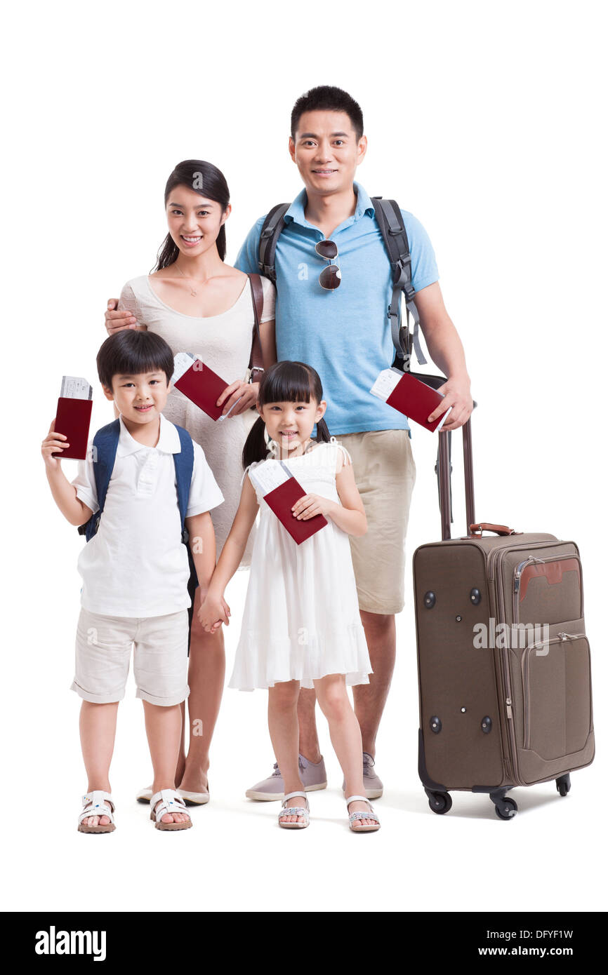 Happy young family going for vacation Stock Photo - Alamy