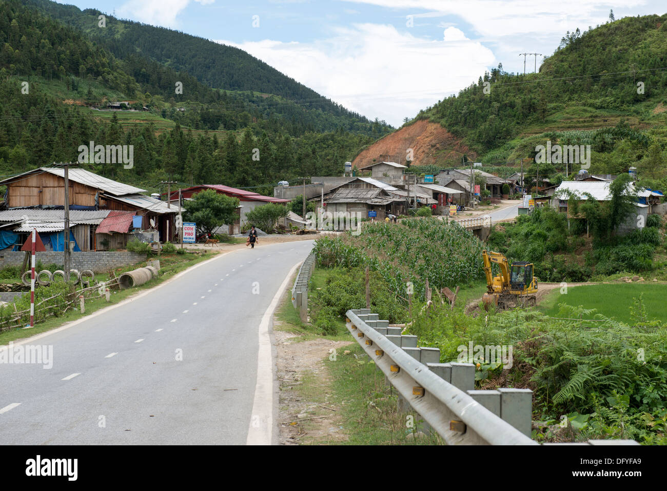 Landscape of rural Sa Pa high land, People make rice terrace and curved path on the mountain. Stock Photo