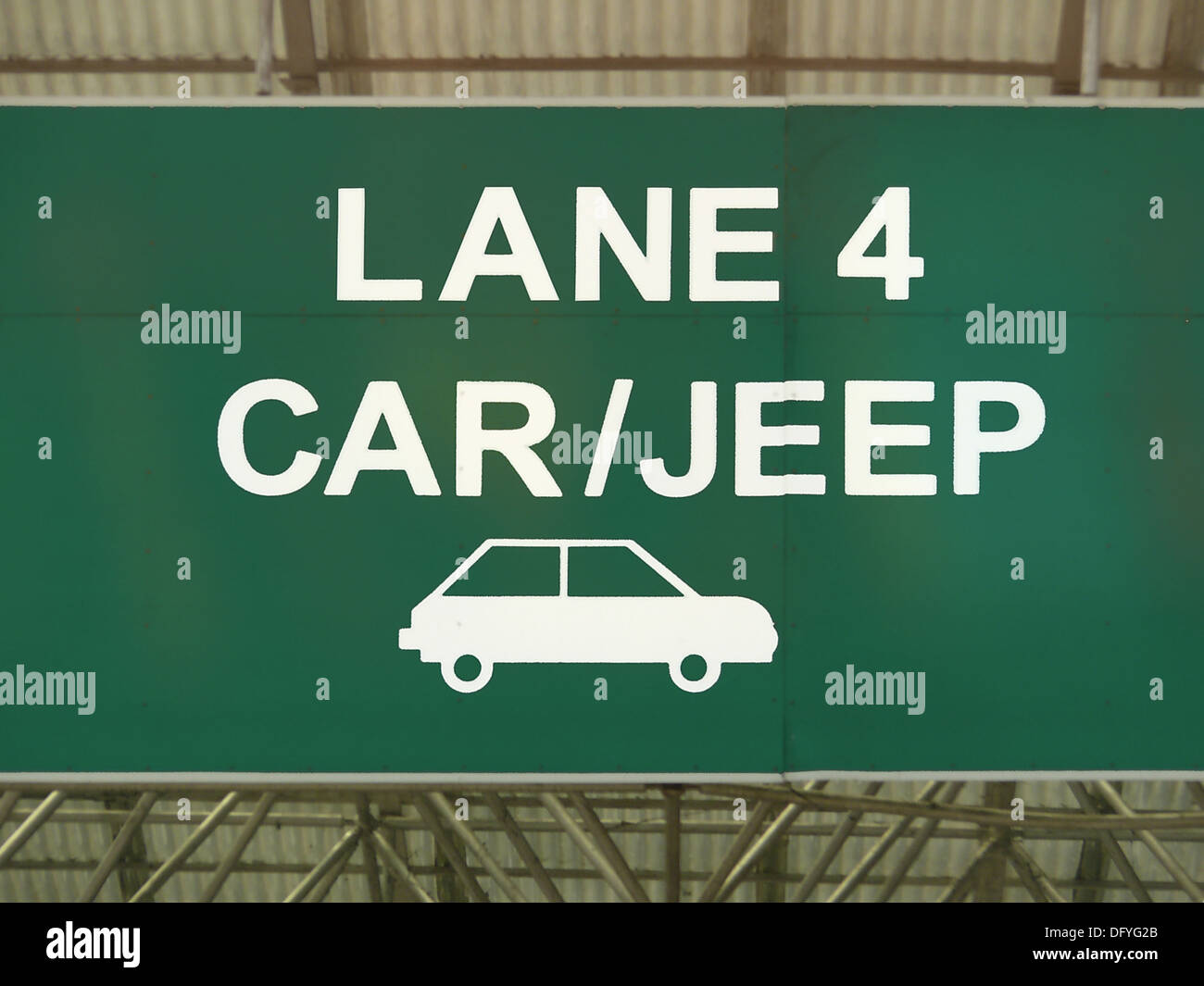 A sign board showing a lane number for car and jeeps at a toll Pune