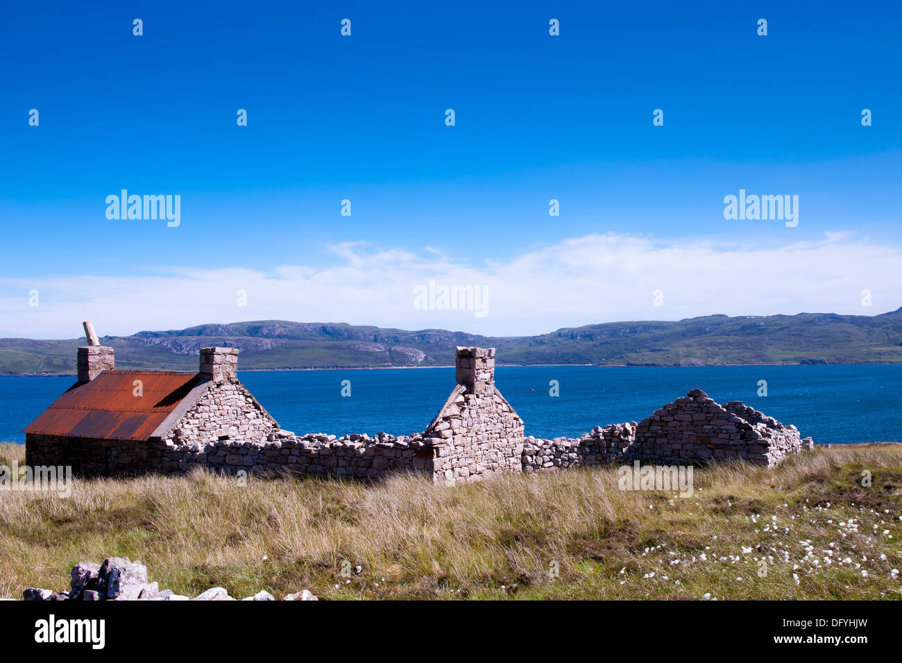 Derelict highland croft with sea view Stock Photo