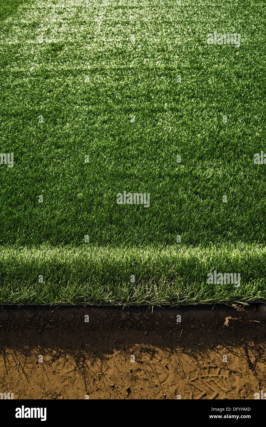 Artificial turf at soccer field, green plastic grass as background Stock Photo Alamy