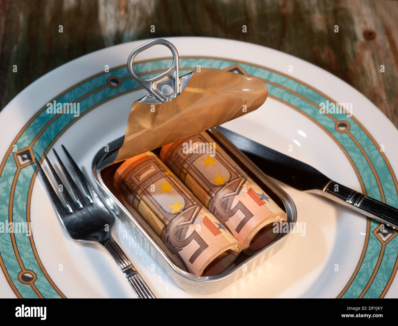 Money in a tin can Stock Photo Alamy