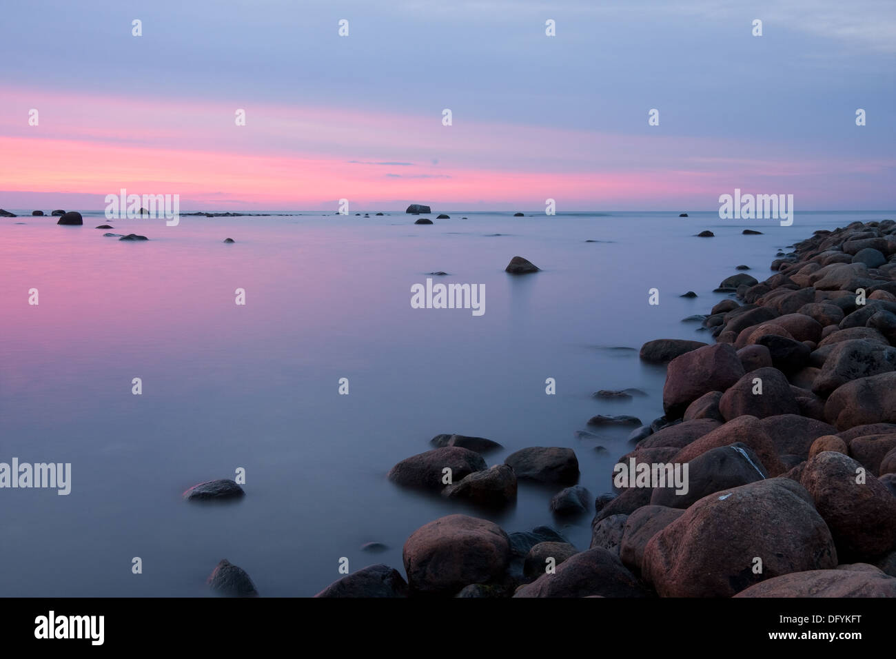 Sunset and a pier Stock Photo - Alamy