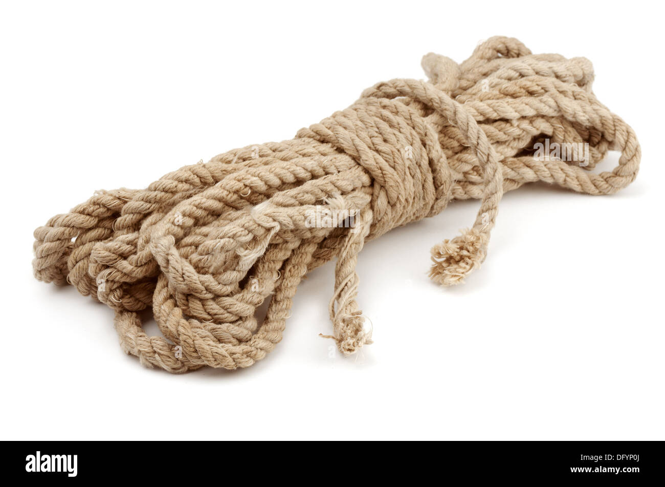 Old coiled rope isolated on white Stock Photo