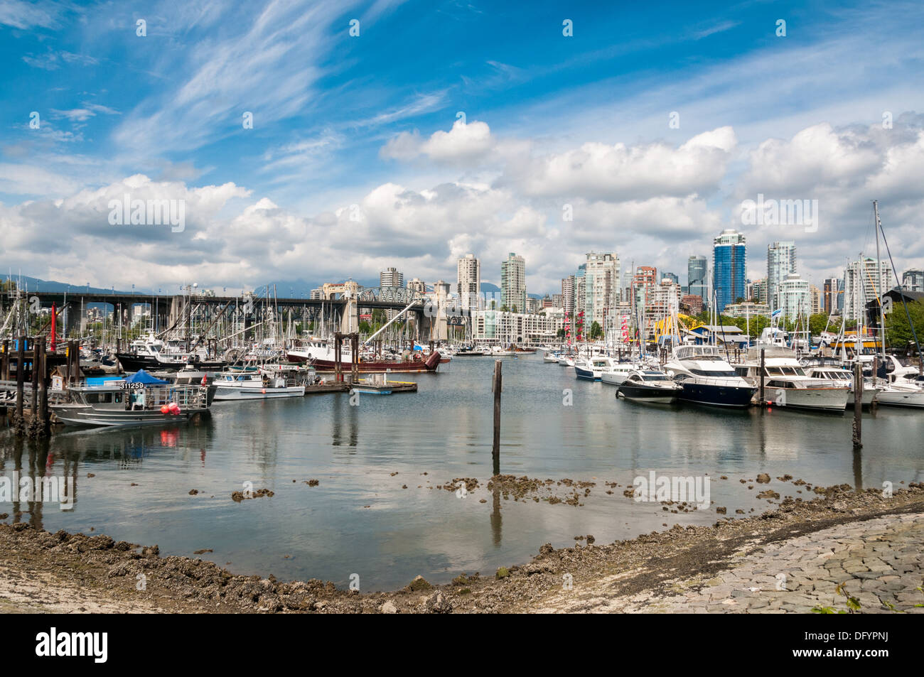 View across the water of Vancouver City from Granville Island Stock Photo