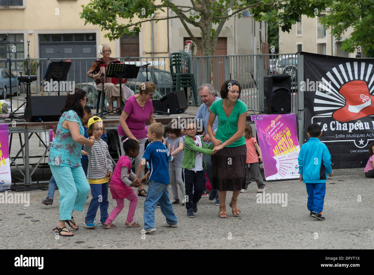 France, Carcassonne, Aude - Fete de la Musique, annual music festival, traditional dacning for children by Le Chapeau Rouge Stock Photo