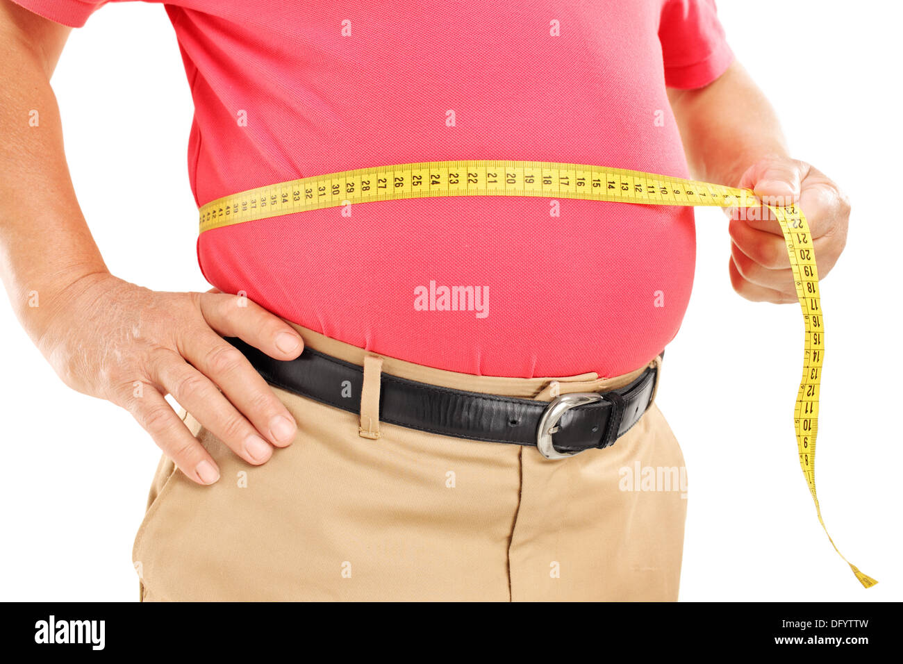 Fat mature man measuring his belly with measurement tape Stock Photo