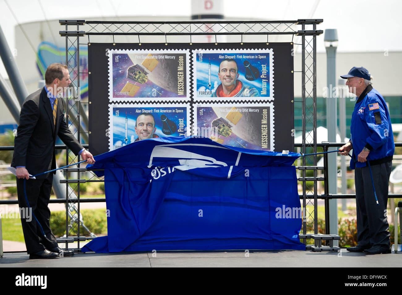 United States Postal Service Vice President of Finance Steve Masse, left, and NASA Mercury Astronaut Scott Carpenter, unveil Postage stamps that commemorate and celebrate 50 years of US Spaceflight May 4, 2011 at the Kennedy Space Center, FL. Carpenter one of the original Mercury Seven astronauts and the second American to orbit the Earth died October 10, 2013 at age 88. Stock Photo