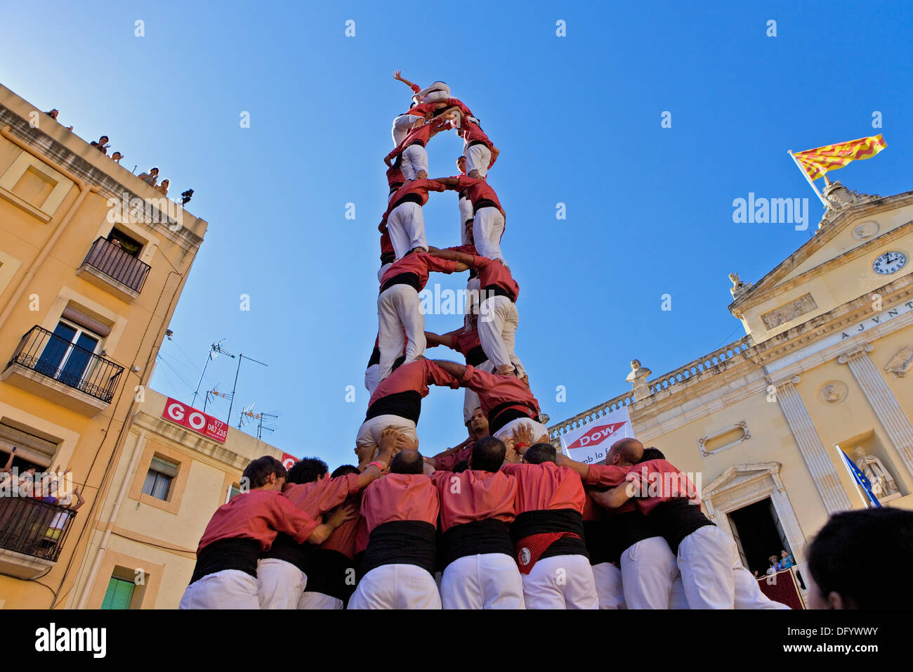 'Castellers' building human tower, a Catalan tradition. Stock Photo