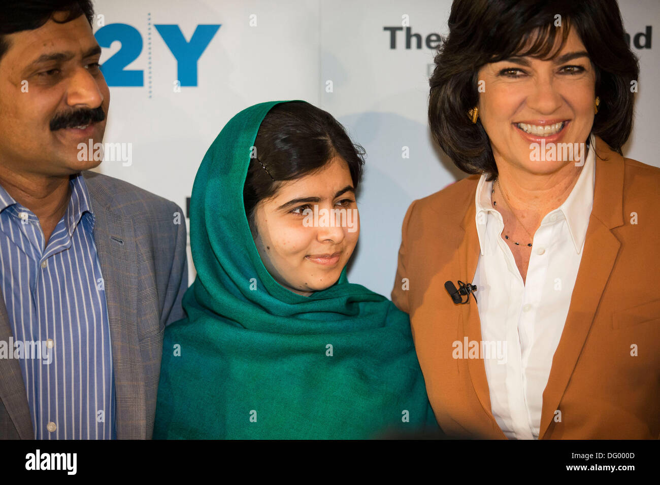 New York, NY, USA. 10th October 2013. Malala Yousafzai with her father and award winning journalist Christiane Amanpour appeared at the 92nd St Y on Manhattans upper east side. Malala when she was 15 was shot in the face by the Talaban because she advocated for education for girls. Malala is in the running for the Nobel Peace Prize. Credit:  Scott Houston/Alamy Live News Stock Photo