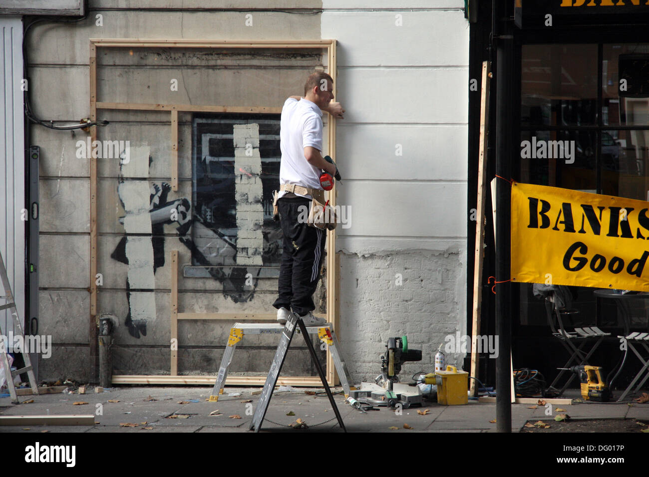 Banksy , Cashing in  in on Previously covered for 2 years CASH MACHINE GIRL  dispute of ownership Stock Photo