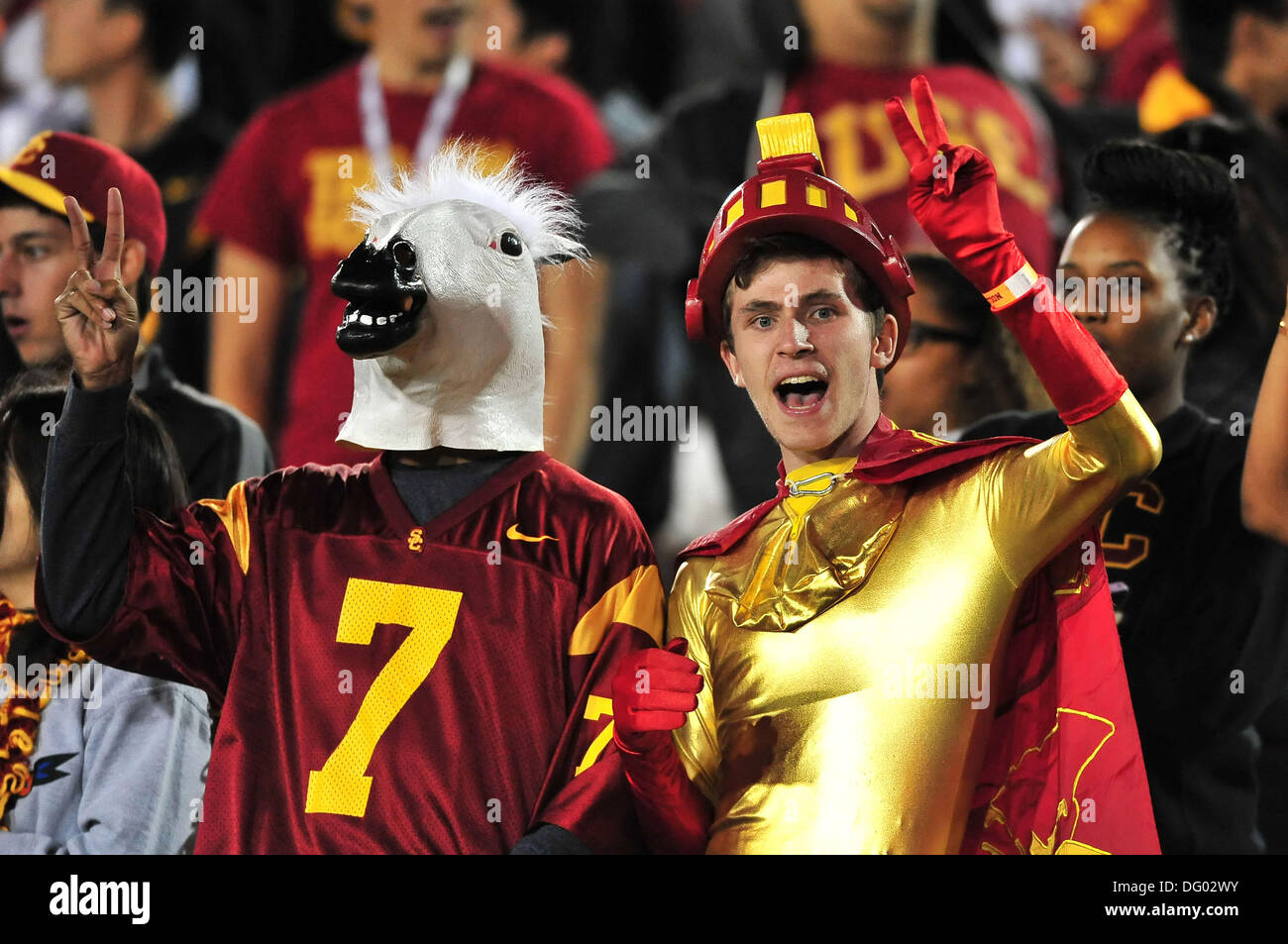 October 10, 2013 Los Angeles, CA.USC Trojans Fans Dressed as the Trojans Mascots Traveler and Tommy Trojan during the NCAA Football game between the USC Trojans and the Arizona Wildcats at the Coliseum in Los Angeles, California.The USC Trojans defeat the Arizona Wildcats 38-31.Louis Lopez/CSM Stock Photo
