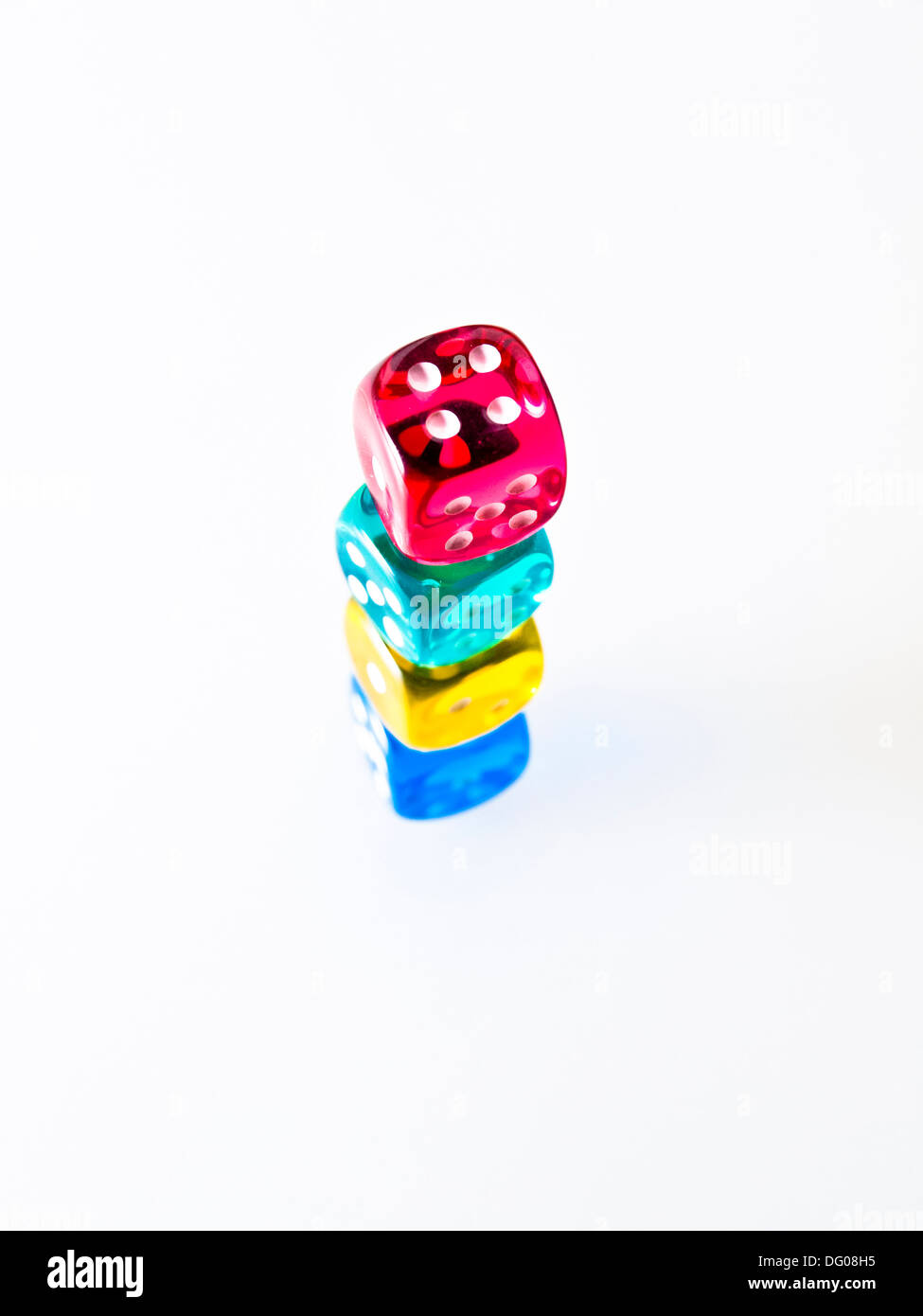 Colorful dice cut out on white background Stock Photo Alamy