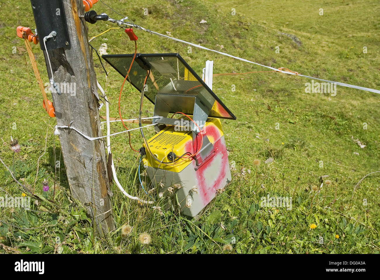 Solar powered electric fence, Switzerland Stock Photo - Alamy