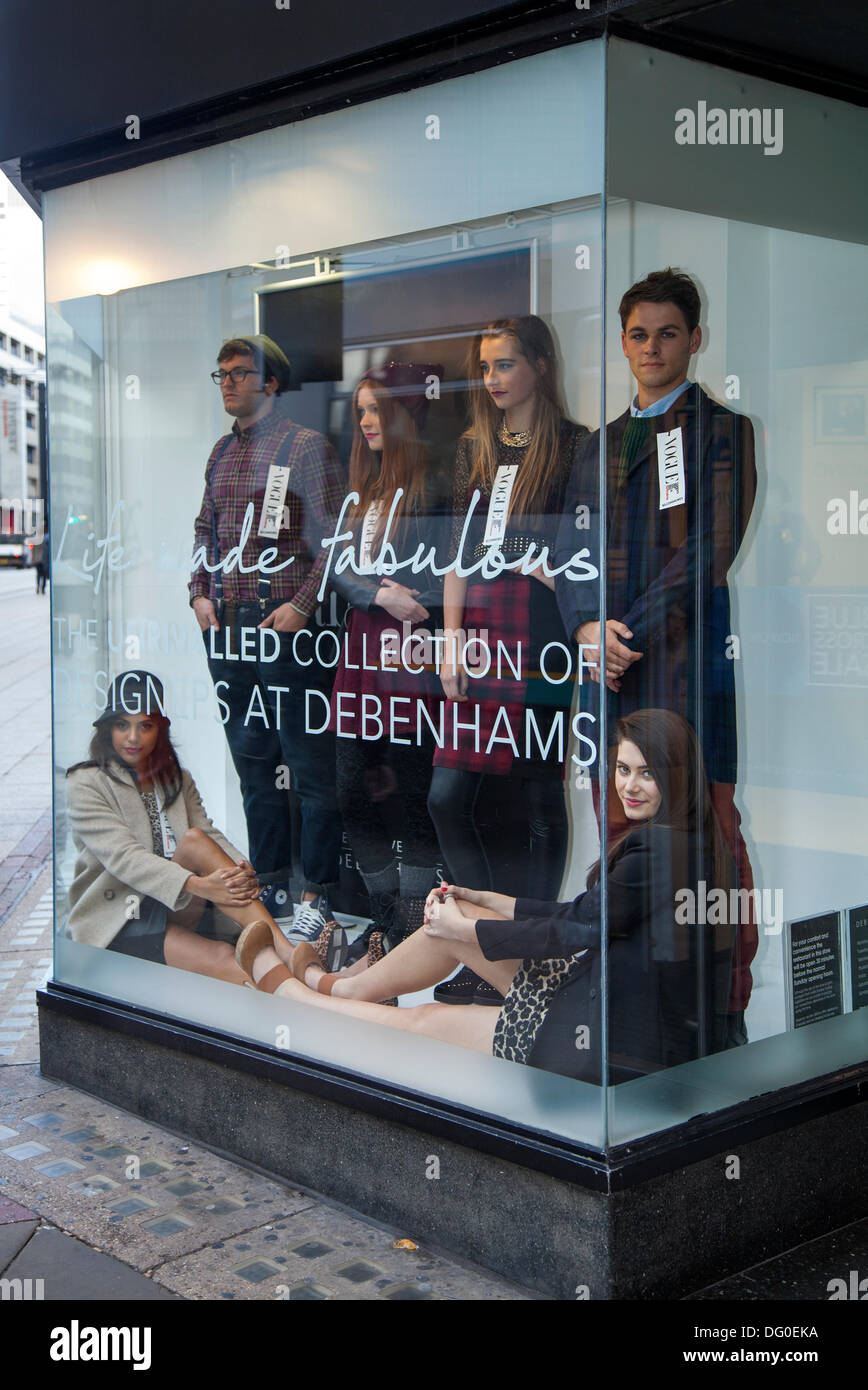 Manchester, UK 10th October, 2013. Live Models in Window display at