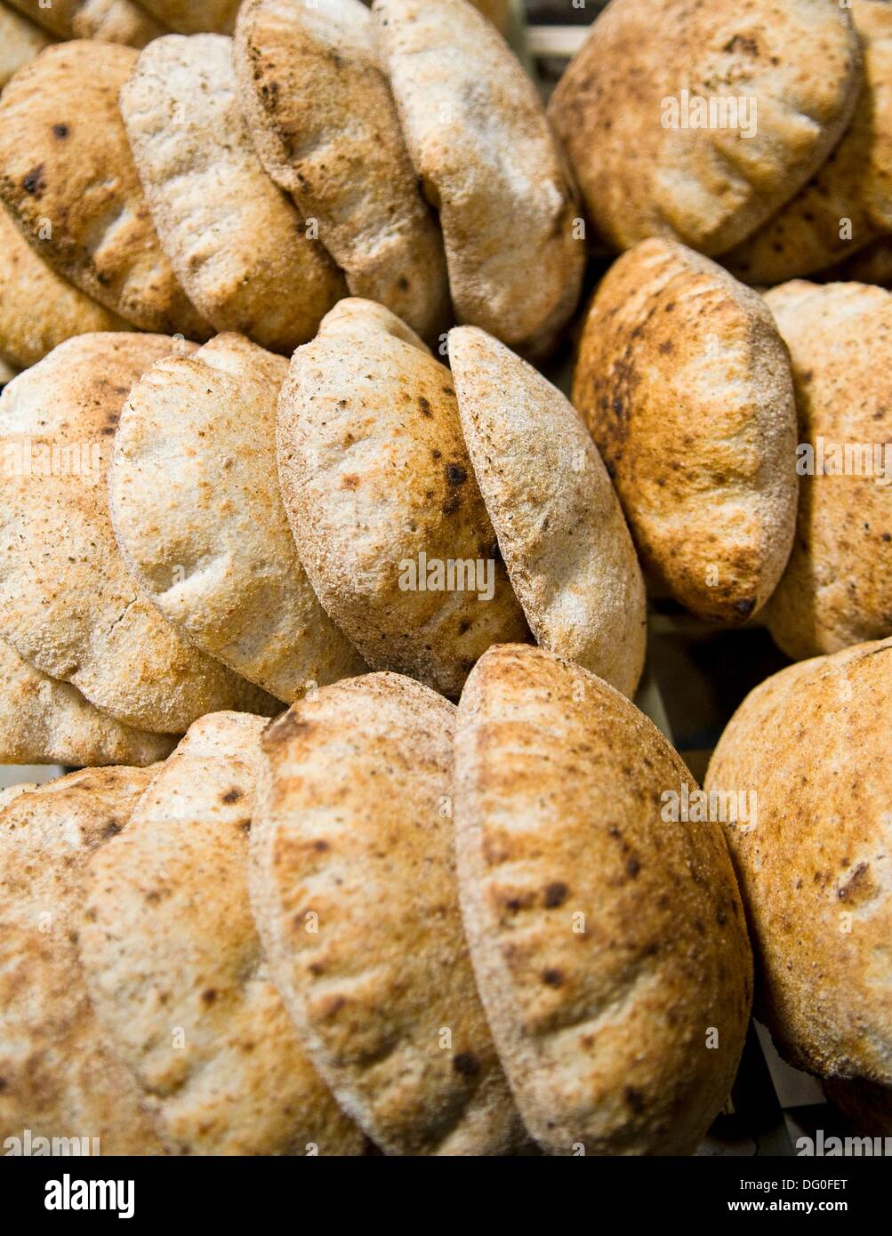 Pita breads in a small bakery in cairo hires stock photography and
