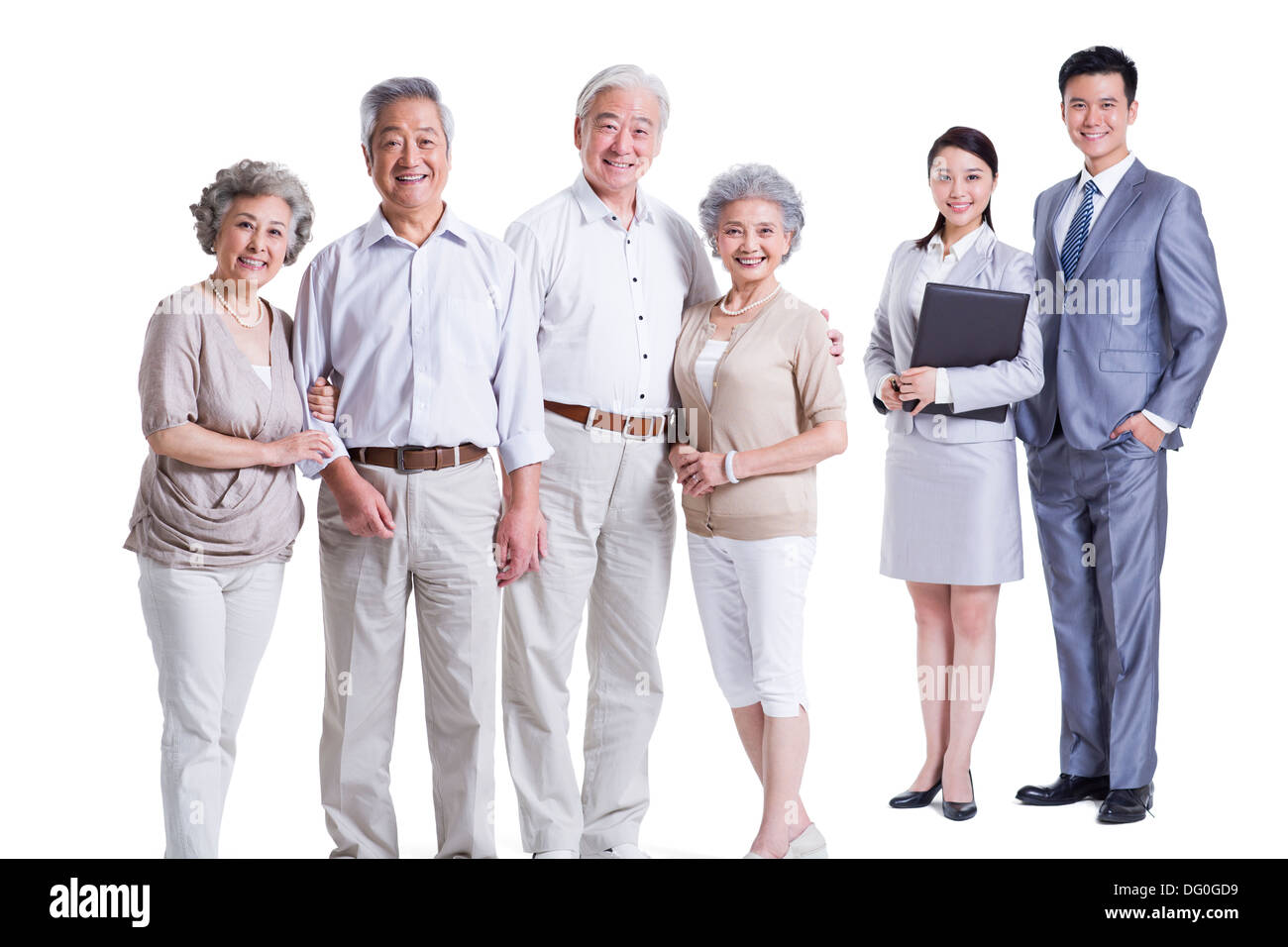Senior couples with financial advisors Stock Photo