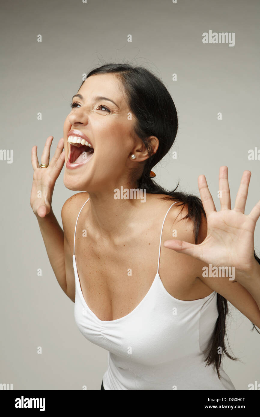 Beautiful Latin woman screams Stock Photo